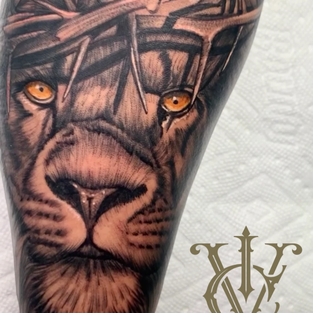 Lion face black and grey tattoo by Vegas Vic
