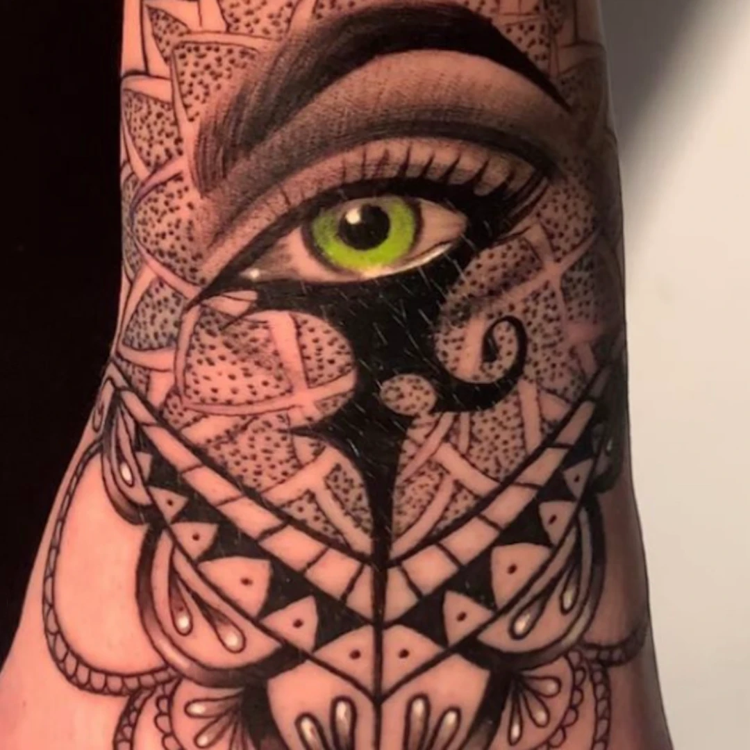 Mandala hand tattoo with eye design by Vegas Vic